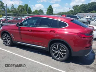 2021 BMW X4 xDrive30i with VIN 5UX2V1C07M9F59530, listed as a IAAI auction lot 42484957 with Not provided miles and . Bid and sale history available at DreamBid. Image 14.