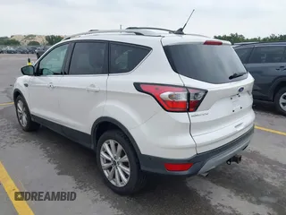 2018 Ford Escape Titanium with VIN 1FMCU9J98JUB87867, listed as a IAAI auction lot 42300123 with 48,357 mi miles and . Bid and sale history available at DreamBid. Image 3.