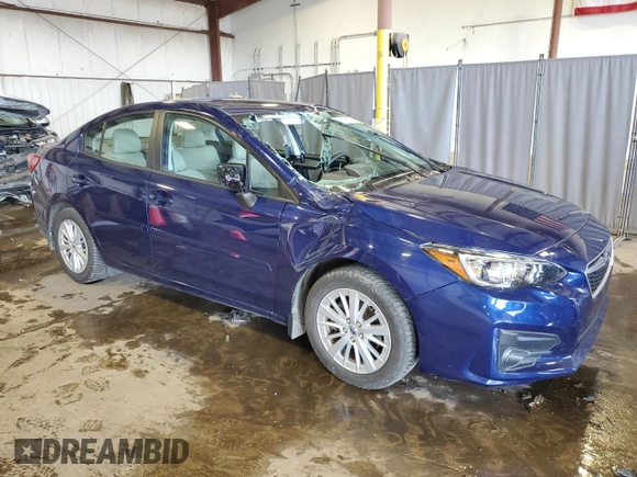 2018 Subaru Impreza Premium with VIN 4S3GKAB65J3621850, listed as a Copart auction lot 63196235 with 50,973 mi miles and Salvage title. Bid and sale history available at DreamBid. Image 4.