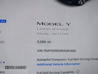 2024 Tesla Model Y Long Range with VIN 7SAYGDEE0RA261489, listed as a IAAI auction lot 41729325 with 5,060 mi miles. Bid and sale history available at carsss.com. Image 15.