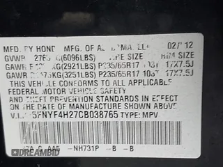 2012 Honda Pilot LX with VIN 5FNYF4H27CB038765, listed as a IAAI auction lot 41963157 with 209,965 mi miles and . Bid and sale history available at carsss.com. Image 9.