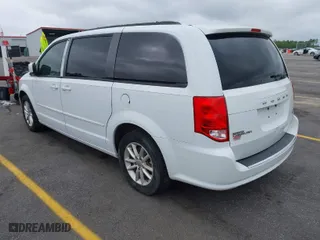 2014 Dodge Grand Caravan SXT with VIN 2C4RDGCG0ER390849, listed as a IAAI auction lot 41957368 with 98,044 mi miles. Bid and sale history available at carsss.com. Image 3.