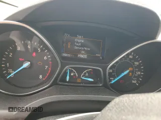 2017 Ford Escape SE z VIN 1FMCU0GD7HUA94744, wystawiony jako Copart lot #54209545 z przebiegiem 99 658 mil mil oraz Szkoda całkowita • Salvage title. Historia ofert i sprzedaży dostępna na DreamBid. Obrazek 9.
