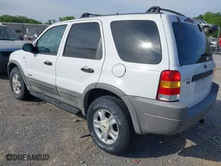 2001 Ford Escape XLT with VIN 1FMYU04151KF69759, listed as a IAAI auction lot 41997906 with 182,133 mi miles. Bid and sale history available at carsss.com. Image 3.