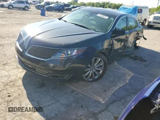 2014 Lincoln MKS EcoBoost z VIN 1LNHL9FT8EG607807, wystawiony jako Copart lot #57755915 z przebiegiem 203 316 mil mil oraz Szkoda całkowita • Salvage title. Historia ofert i sprzedaży dostępna na DreamBid. Obrazek 1.