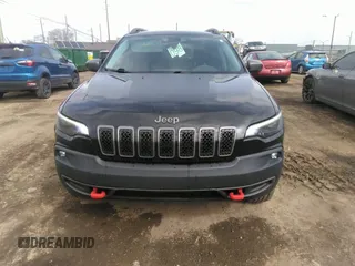 2019 Jeep Cherokee Trailhawk with VIN 1C4PJMBX1KD331128, listed as a IAAI auction lot 41983976 with 110,190 mi miles and . Bid and sale history available at DreamBid. Image 12.