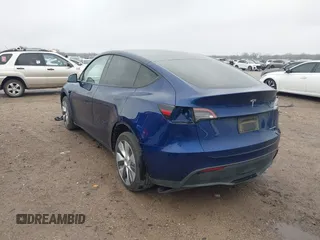 2023 Tesla Model Y Long Range with VIN 7SAYGDEE4PA064743, listed as a IAAI auction lot 41523760 with 41,113 mi miles. Bid and sale history available at carsss.com. Image 3.