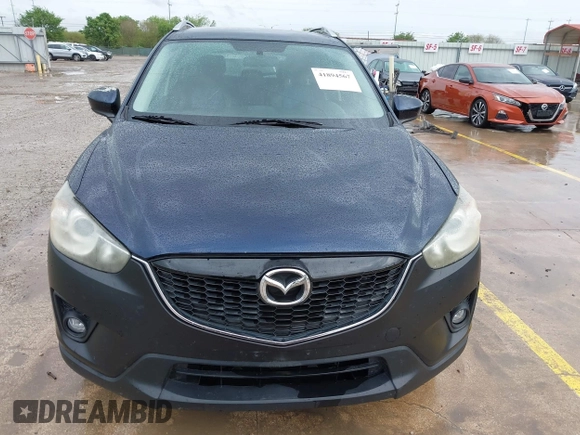 2015 Mazda CX-5 Touring with VIN JM3KE2CY5F0449195, listed as a IAAI auction lot 41894567 with 124,694 mi miles and . Bid and sale history available at DreamBid. Image 12.
