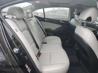 2014 Kia Cadenza Premium z VIN KNALN4D74E5142310, wystawiony jako Copart lot #56832925 z przebiegiem 255 812 mil mil oraz Szkoda całkowita • Salvage title. Historia ofert i sprzedaży dostępna na DreamBid. Obrazek 10.