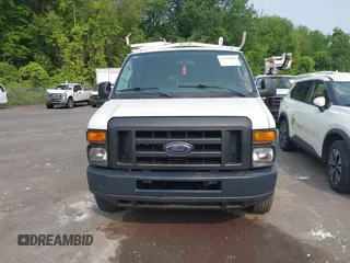 2011 Ford Econoline Cargo Commercial with VIN 1FTNE2ELXBDA18412, listed as a IAAI auction lot 42328684 with 115,484 mi miles and . Bid and sale history available at DreamBid. Image 13.