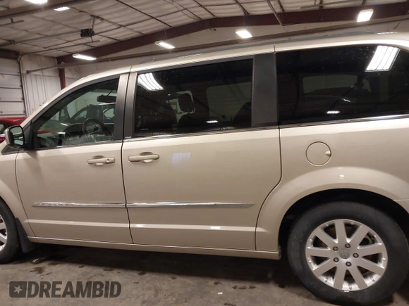 2012 Chrysler Town & Country Touring with VIN 2C4RC1BG3CR363854, listed as a IAAI auction lot 41733016 with 76,869 mi miles. Bid and sale history available at carsss.com. Image 14.