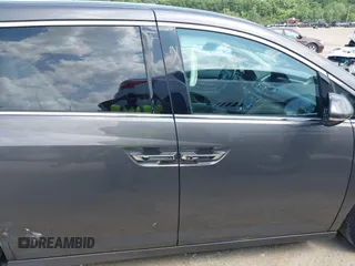 2014 Honda Odyssey Touring with VIN 5FNRL5H99EB138952, listed as a IAAI auction lot 42538833 with 146,959 mi miles and . Bid and sale history available at DreamBid. Image 13.
