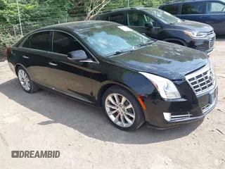 2015 Cadillac XTS Luxury with VIN 2G61N5S36F9125192, listed as a IAAI auction lot 42673741 with 122,614 mi miles and . Bid and sale history available at DreamBid. Image 1.