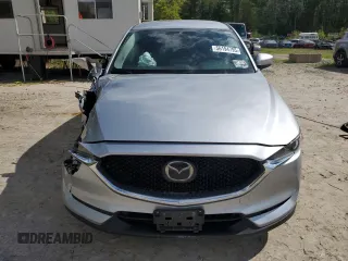 2021 Mazda CX-5 Touring z VIN JM3KFBCM1M0343804, wystawiony jako Copart lot #56194795 z przebiegiem 100 039 mil mil oraz Tytuł czysty. Historia ofert i sprzedaży dostępna na DreamBid. Obrazek 5.