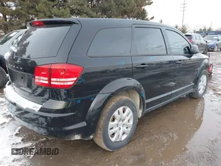 2014 Dodge Journey American Value Pkg with VIN 3C4PDCAB4ET283985, listed as a IAAI auction lot 41617089 with 155,860 mi miles. Bid and sale history available at carsss.com. Image 4.