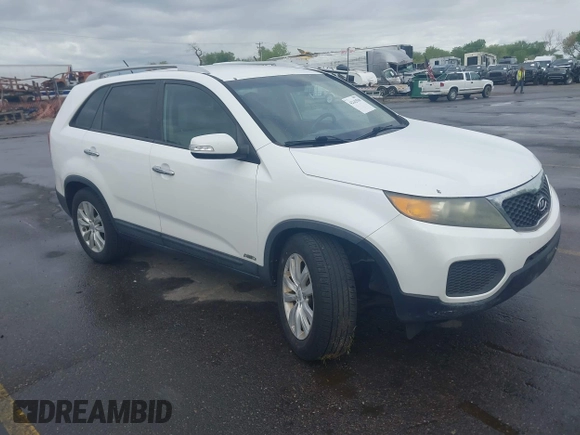 2011 Kia Sorento LX with VIN 5XYKTDA23BG060231, listed as a IAAI auction lot 42142538 with 166,884 mi miles. Bid and sale history available at carsss.com. Image 1.