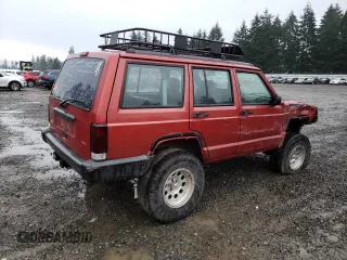 1999 Jeep Cherokee SE with VIN 1J4FF28S9XL645291, listed as a Copart auction lot 87064124 with Not provided miles and Salvage title. Bid and sale history available at DreamBid. Image 3.