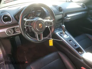 2017 Porsche 718 Boxster z VIN WP0CA2A81HS221942, wystawiony jako Copart lot #36581523 z przebiegiem 73 954 mil mil oraz . Historia ofert i sprzedaży dostępna na DreamBid. Obrazek 8.