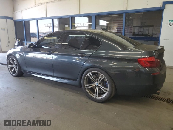 2013 BMW M5 z VIN WBSFV9C54DC773221, wystawiony jako Copart lot #54831865 z przebiegiem 127 949 mil mil oraz Czysty tytuł • Clean title. Historia ofert i sprzedaży dostępna na DreamBid. Obrazek 2.