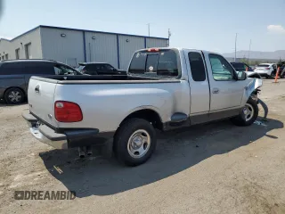 2001 Ford F-150 XL with VIN 1FTRX07L71KA57207, listed as a Copart auction lot 64843825 with Not provided miles and Salvage title. Bid and sale history available at DreamBid. Image 3.