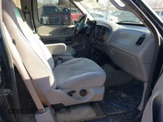 1997 Ford F-150 XL with VIN 1FTDX18W7VKC26527, listed as a IAAI auction lot 41692112 with 187,720 mi miles. Bid and sale history available at carsss.com. Image 5.