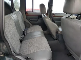 1996 Jeep Cherokee Country with VIN 1J4FJ78S7TL242853, listed as a Copart auction lot 73022554 with 84,868 mi miles and Salvage Title. Bid and sale history available at carsss.com. Image 11.