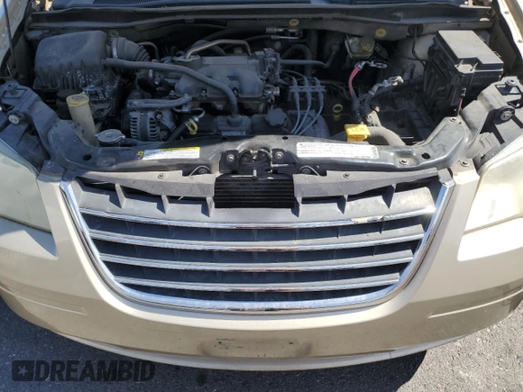 2010 Chrysler Town & Country LX with VIN 2A4RR4DE0AR188949, listed as a Copart auction lot 54140515 with 185,534 mi miles and Salvage Title. Bid and sale history available at DreamBid. Image 12.