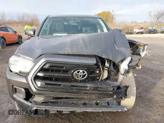 2016 Toyota Tacoma SR5 with VIN 5TFAX5GN1GX056450, listed as a IAAI auction lot 41215339 with 129,604 mi miles. Bid and sale history available at carsss.com. Image 13.