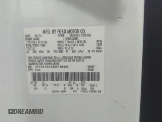 2014 Ford F-150 XL with VIN 1FTFX1EFXEKE16495, listed as a IAAI auction lot 41077199 with 206,212 mi miles. Bid and sale history available at carsss.com. Image 9.