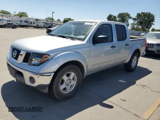 2007 Nissan Frontier SE z VIN 1N6AD07U87C443259, wystawiony jako Copart lot #57174005 z przebiegiem 151 480 mil mil oraz Szkoda całkowita • Salvage title. Historia ofert i sprzedaży dostępna na DreamBid. Obrazek 1.