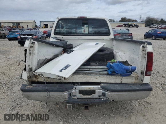 2002 Ford F-250 XL with VIN 1FTNX20L42EB96327, listed as a Copart auction lot 79085684 with 294,625 mi miles and Salvage title. Bid and sale history available at DreamBid. Image 6.