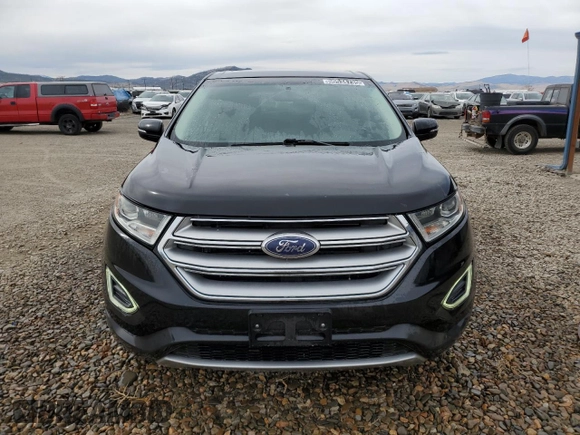 2015 Ford Edge Titanium z VIN 2FMTK4K91FBB09452, wystawiony jako Copart lot #50534735 z przebiegiem 138 446 mil mil oraz Czysty tytuł • Clean title. Historia ofert i sprzedaży dostępna na DreamBid. Obrazek 5.