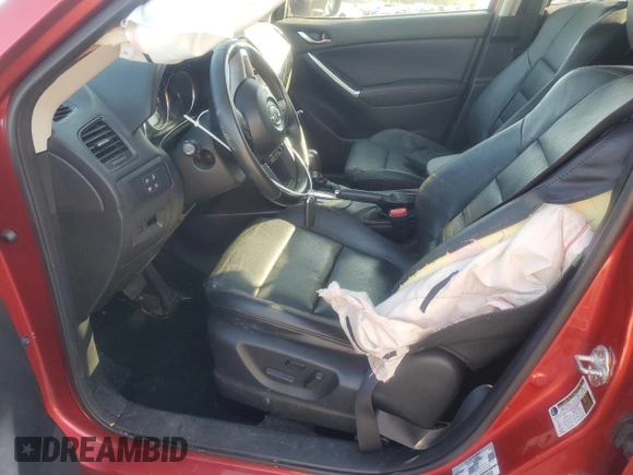 2014 Mazda CX-5 Grand Touring with VIN JM3KE4DY9E0419111, listed as a Copart auction lot 52250315 with 130,003 mi miles and Salvage Title. Bid and sale history available at DreamBid. Image 7.