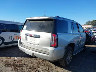 2018 GMC Yukon Denali with VIN 1GKS1CKJ9JR241330, listed as a IAAI auction lot 41180538 with 100,300 mi miles. Bid and sale history available at carsss.com. Image 4.