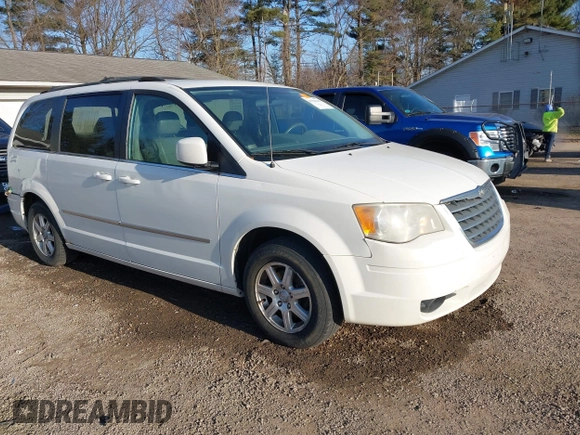 2009 Chrysler Town & Country Touring with VIN 2A8HR54179R631851, listed as a IAAI auction lot 41786165 with 126,988 mi miles and . Bid and sale history available at DreamBid. Image 1.