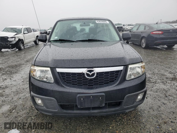 2011 Mazda Tribute Touring with VIN 4F2CY0C79BKM01536, listed as a Copart auction lot 43838095 with 68,271 mi miles and Salvage Title. Bid and sale history available at carsss.com. Image 5.