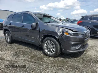 2019 Jeep Cherokee Latitude Plus with VIN 1C4PJLLN0KD119876, listed as a Copart auction lot 60462765 with 61,909 mi miles and Salvage title. Bid and sale history available at DreamBid. Image 4.