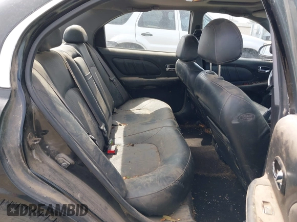 2004 Hyundai Sonata GLS with VIN KMHWF35H24A959811, listed as a IAAI auction lot 42145988 with 206,487 mi miles. Bid and sale history available at carsss.com. Image 8.