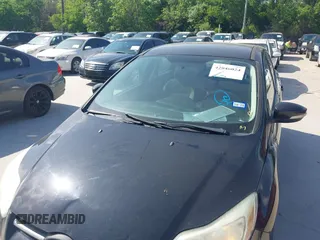 2013 Ford Focus SE with VIN 1FADP3F28DL302475, listed as a IAAI auction lot 42046024 with 110,446 mi miles. Bid and sale history available at carsss.com. Image 6.