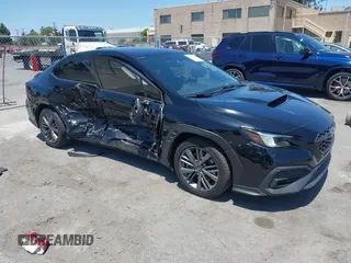 2022 Subaru WRX z VIN JF1VBAA62N9002933, wystawiony jako IAAI lot #42587255 z przebiegiem 68 278 mil mil oraz . Historia ofert i sprzedaży dostępna na DreamBid. Obrazek 1.