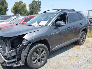 2023 Toyota RAV4 Hybrid XLE Premium with VIN 4T3B6RFV9PU117919, listed as a IAAI auction lot 42528322 with 27,236 mi miles and . Bid and sale history available at DreamBid. Image 2.