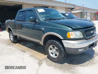 2003 Ford F-150 XLT with VIN 1FTRW08L73KA63027, listed as a IAAI auction lot 42328395 with 184,840 mi miles and . Bid and sale history available at DreamBid. Image 1.