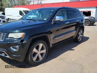 2014 Jeep Grand Cherokee Overland with VIN 1C4RJFCT7EC187319, listed as a Copart auction lot 55284615 with 98,314 mi miles and Clean Title. Bid and sale history available at DreamBid. Image 2.