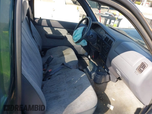 1999 Toyota Tacoma with VIN 4TANL42N7XZ481489, listed as a IAAI auction lot 40365153 with 218,971 mi miles. Bid and sale history available at carsss.com. Image 5.