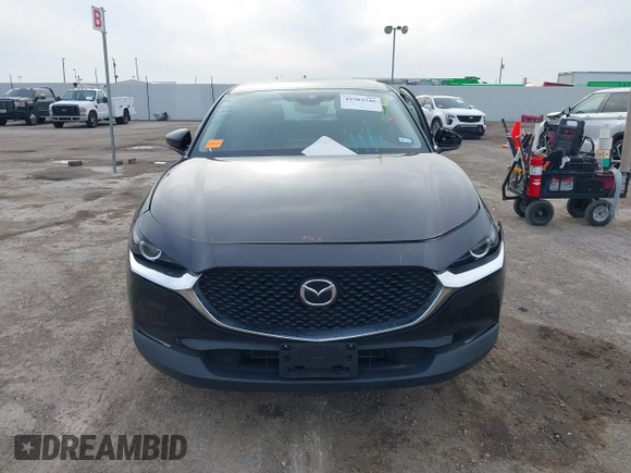 2021 Mazda CX-30 2.5 S with VIN 3MVDMAAL2MM303321, listed as a IAAI auction lot 41583346 with 57,122 mi miles. Bid and sale history available at carsss.com. Image 12.