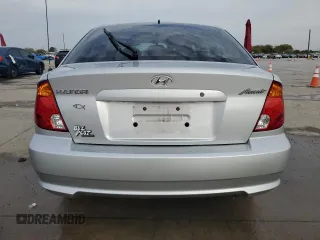 2005 Hyundai Accent GLS with VIN KMHCG35C45U329244, listed as a Copart auction lot 82548424 with 81,191 mi miles and Clean Title. Bid and sale history available at carsss.com. Image 6.