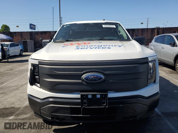 2023 Ford F-150 Lightning Pro с VIN 1FTVW1EL2PWG13712, выставлен на аукционе Copart как лот 56950955 с пробегом 60 605 миль миль и Списание • Salvage title. История ставок и продаж доступна на DreamBid. Изображение 5.