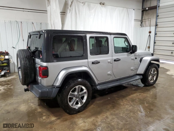 2019 Jeep Wrangler Unlimited Sahara with VIN 1C4HJXEN2KW595950, listed as a Copart auction lot 51264205 with 125,238 mi miles and Salvage Title. Bid and sale history available at carsss.com. Image 3.