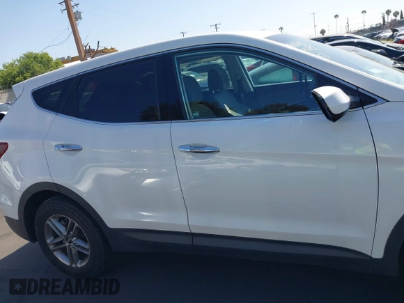 2017 Hyundai Santa Fe 2.4L z VIN 5XYZTDLB0HG403842, wystawiony jako IAAI lot #42206543 z przebiegiem 77 900 mil mil oraz . Historia ofert i sprzedaży dostępna na DreamBid. Obrazek 14.