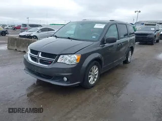 2019 Dodge Grand Caravan SXT with VIN 2C4RDGCG3KR543221, listed as a IAAI auction lot 41528859 with 129,778 mi miles and . Bid and sale history available at DreamBid. Image 2.
